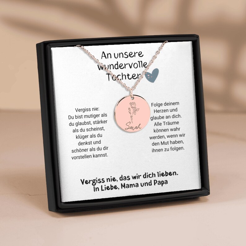 a necklace with a picture of a woman on it