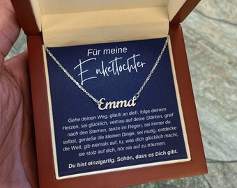 May include: A silver necklace with the name "Emma" on it, in a blue box with a message that reads "For my granddaughter". The message continues with a quote about following your dreams and being unique.