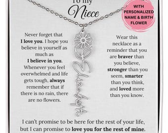 May include: A silver necklace with a flower charm and a personalized nameplate that reads "Elizabeth". The necklace comes in a white box with a message that says "To my Niece" and "Never forget that I love you. I hope you believe in yourself as much as I believe in you. Whenever you feel overwhelmed and life gets tough, always remember that if there is no rain, there are no flowers. Wear this necklace as a reminder that you are braver than you believe, stronger than you seem, smarter than you think, and loved more than you know. I can't promise to be here for the rest of your life, but I can promise to love you for the rest of mine."