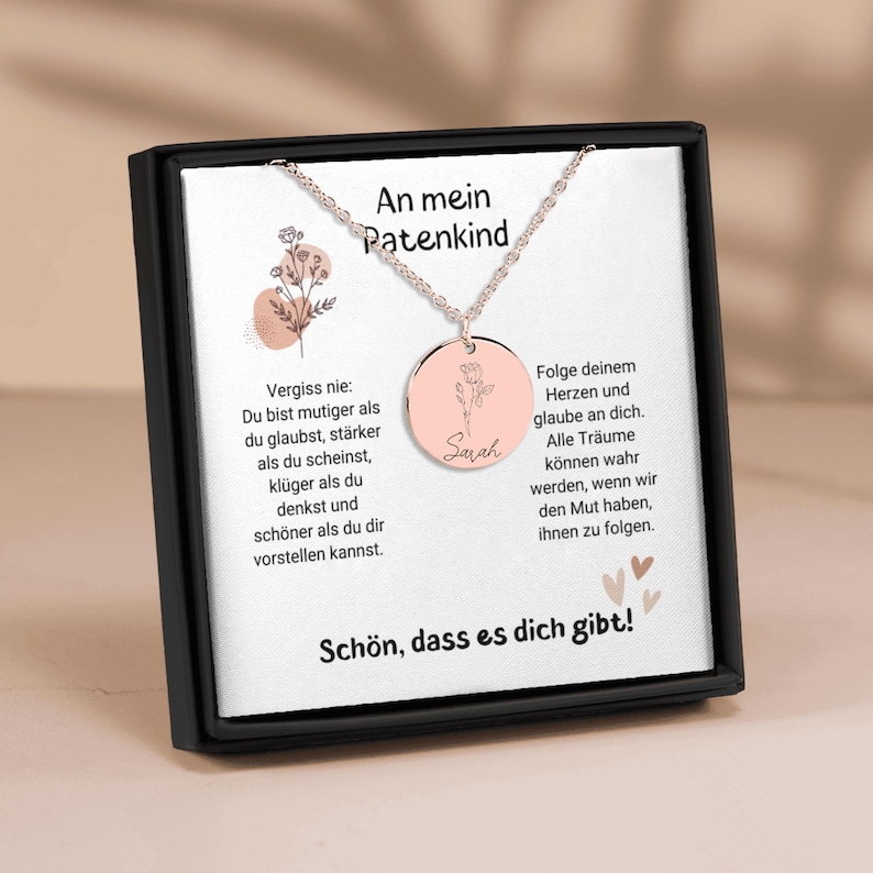 a necklace with a picture of a woman on it