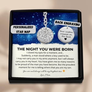 May include: A silver star map pendant with a chain, in a black box. The pendant has a star chart design and the text "The Night You Were Born." Includes space for a custom message on the back.