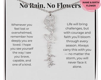 May include: A silver-colored necklace with a flower pendant and the name "Elizabeth" in cursive script. The necklace is displayed on a card with the text "No Rain, No Flowers" and inspirational quotes. The card also includes the phrase "Love, now and forever."