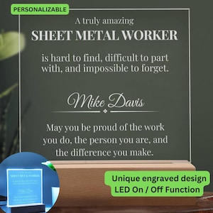 May include: A personalized acrylic plaque with a wooden base. The plaque reads "SHEET METAL WORKER" with a message and a name. The design includes the text "Unique engraved design" and "LED On / Off Function".