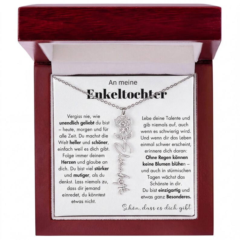 An meine Enkeltochter necklace with a silver pendant featuring a flower design.
