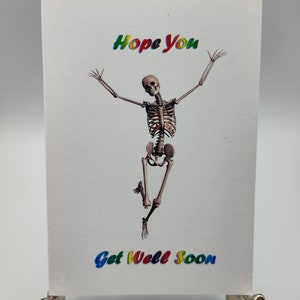 Skelet hoop dat je snel beter wordt A6/A5 wenskaart Hoge kwaliteit print op 300gsm gladde kaart. Wordt geleverd met Conqueror-envelop.
