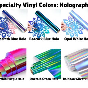 Puede incluir: Colores de vinilo especiales: Hologr&aacute;fico. Seis rollos de vinilo hologr&aacute;fico en azul jacinto, azul pavo real, blanco &oacute;palo, morado orqu&iacute;dea, verde esmeralda y plata arco&iacute;ris. La imagen muestra rollos de vinilo adhesivo con acabados met&aacute;licos.