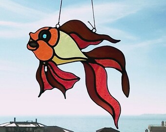 Funny fish. Stained glass suncatcher as a gift to friends