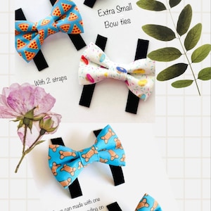 May include: Extra small bow ties in various patterns, including pizza slices, dog bones, and paw prints. The bows have black straps and are available with one or two straps. The text "Extra Small Bow ties" is visible.