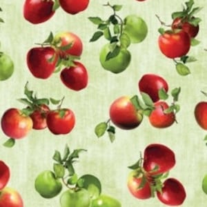 May include: A fabric pattern featuring red and green apples with green leaves on a light green background. The section measures approximately 51 cm x 51 cm.