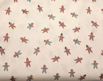 Tossed Gingerbread Men on Beige Quilting Fabric - 100% cotton - great for crafting, etc. - Sold by the 1/2 yard