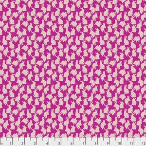 May include: A vibrant magenta fabric featuring a repeating pattern of small, light beige rabbit silhouettes oriented in various directions. At the bottom, a white ruler with black markings measures from 1 to 12 inches across the width.