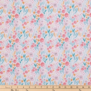 May include: A white fabric with a repeating pattern of pink, yellow, and blue flowers and leaves. The fabric has a subtle watercolor effect.