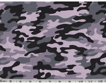 May include: Camouflage fabric in shades of black, gray, and light purple. The fabric has a repeating pattern of irregular shapes.