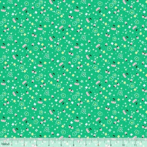 May include: A green fabric with a repeating pattern of small white flowers, green stars, and pink cherries.