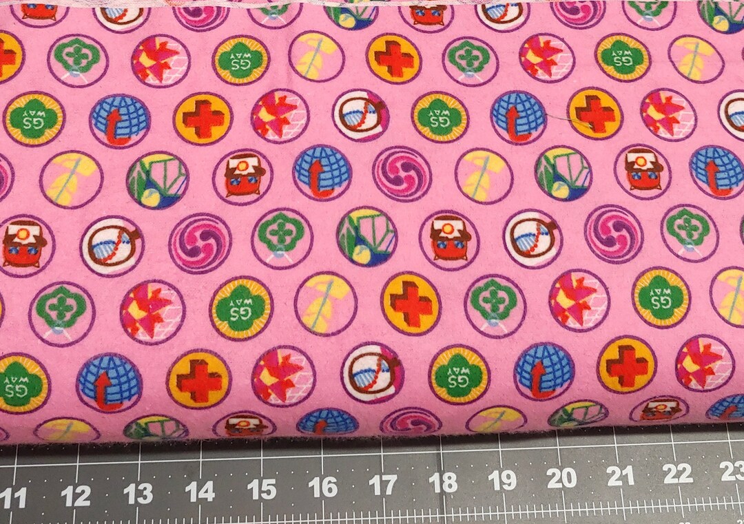Girl Scouts Flannel Badges on Pink Quilting Fabric 100 Cotton 1/2 Yd