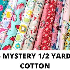 May include: Five mystery fabric bundles, each measuring 1/2 yard, featuring a variety of colorful cotton prints. The prints include owls, cats, watermelons, and floral patterns.