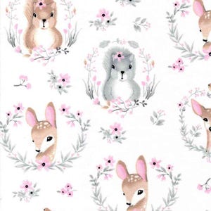 May include: White fabric with a repeating pattern of woodland animals and floral wreaths. The design features squirrels, deer, and small birds, each surrounded by a wreath of gray leaves and pink flowers. The animals are in soft, muted colors.