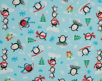 Penguin Fun Winter Sports Toss Christmas Quilting Fabric - 100% cotton -  BY THE 1/2 YARD