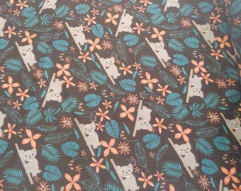 May include: A brown fabric with a repeating pattern of koala bears climbing trees. The koalas are white with black outlines and are surrounded by teal leaves and orange flowers.