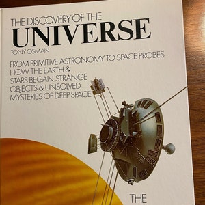 May include: A book cover featuring a yellow and orange illustration of a planet with a spacecraft orbiting it. The book title is "The Discovery of the Universe" by Tony Osman. The subtitle is "From Primitive Astronomy to Space Probes. How the Earth & Stars Began. Strange Objects & Unsolved Mysteries of Deep Space." The book is part of "The Museum of Discovery" series.
