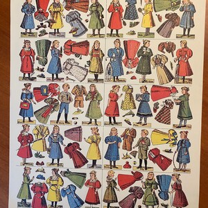 May include: A vintage paper doll set featuring 16 different dolls with various outfits and accessories. The dolls are dressed in colourful clothing, including dresses, skirts, blouses, and hats. The set includes a variety of accessories, such as umbrellas, purses, and shoes. The paper dolls are printed on a white background with black outlines.