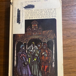 May include: A vintage book titled "Four Great Elizabethan Plays" with a cover illustration of costumed figures. The book has a cream-colored cover with text and library labels. The cover art depicts a group of people in period clothing.