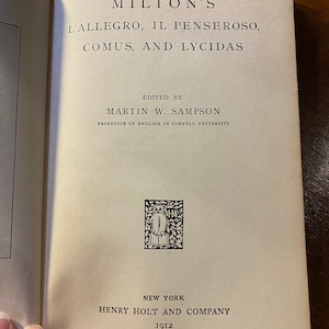 May include: A vintage book cover with the title "Milton's L'Allegro, Il Penseroso, Comus, and Lycidas" edited by Martin W. Sampson, Professor of English in Cornell University. The book was published in 1912 by Henry Holt and Company in New York.