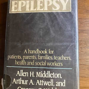 May include: A hardcover book titled "EPILEPSY" with a black cover and white text. The book is a handbook for patients, families, and health workers. Authors include Allen H. Middleton, Arthur A. Attwell, and Gregory O. Walsh.