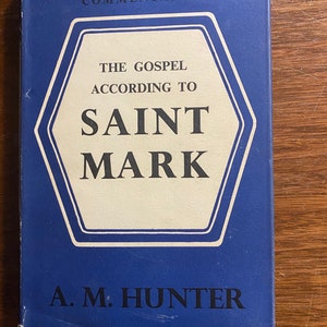 May include: A blue book with the title "The Gospel According to Saint Mark" in a white hexagon. The book is part of "The Torch Bible Commentaries" series and is authored by A.M. Hunter.