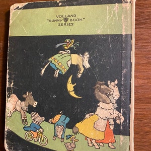 K&ouml;nnte beinhalten: Ein Vintage-Kinderbuchcover mit schwarzem Hintergrund und bunten Illustrationen von Tieren. Der Buchtitel lautet "Sunny Book" und der Verlag ist "Volland Series".