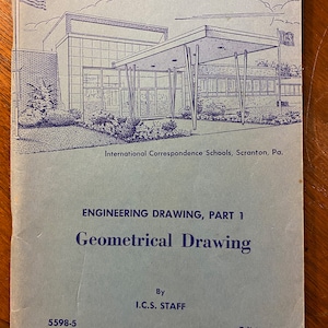 May include: A blue and white cover of a book titled "Engineering Drawing, Part 1 Geometrical Drawing" by I.C.S. Staff. The book is edition 4 and has 6 assignments. The cover features a black and white illustration of a building with a large awning.