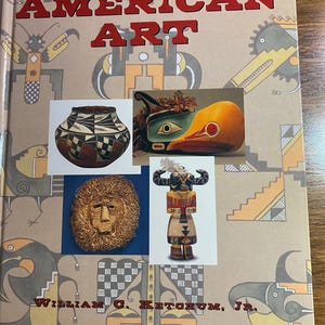 May include: A book titled "Native American Art" with a tan cover and red lettering. The cover features illustrations of Native American art, including a pot, a bird mask, a lion's face, and a carved figure.