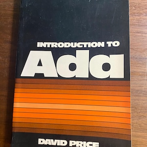 May include: A vintage book titled "Introduction to Ada" by David Price. The cover is black with white text and a horizontal striped design in shades of orange and brown. The book appears to be in good condition.