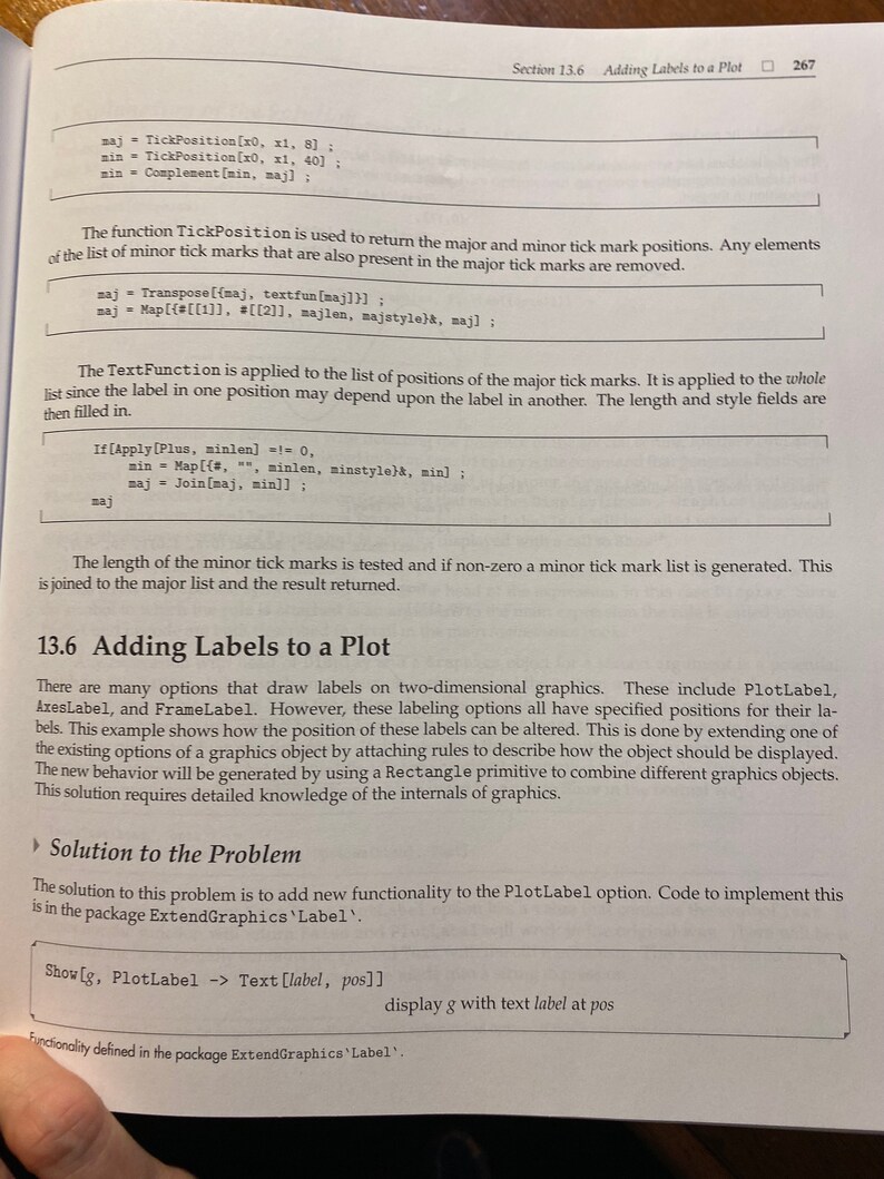 May include: A page from a textbook on computer programming, showing code examples for adding labels to a plot. The text discusses the use of the TickPosition function to return major and minor tick mark positions, and the TextFunction to apply labels to the plot.