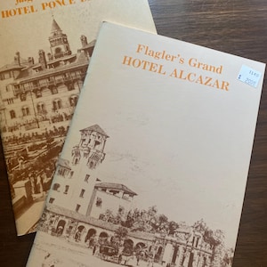 May include: Two vintage brochures with architectural illustrations. One reads "Flagler's magnificent HOTEL PONCE DE LEON" and the other "Flagler's Grand HOTEL ALCAZAR". Both have price tags.