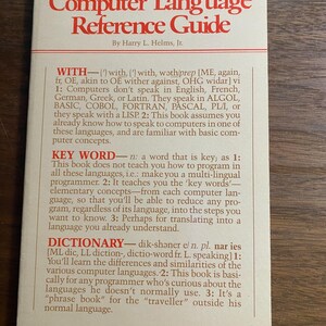 May include: A vintage "Computer Language Reference Guide" book by Harry L. Helms, Jr. The cover is cream-colored with red text. The title is prominently displayed, and the book provides information on computer languages, including ALGOL, BASIC, and FORTRAN.