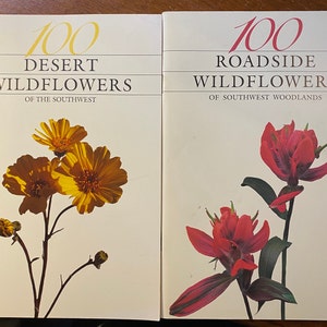 May include: Two books with yellow and red wildflowers on the covers. The book on the left is titled "100 Desert Wildflowers of the Southwest". The book on the right is titled "100 Roadside Wildflowers of Southwest Woodlands".