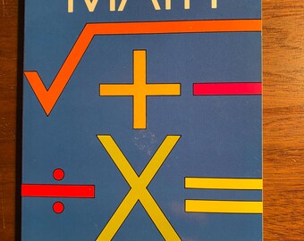 May include: A blue book cover with the title "SHORT-CUT MATH" in white letters. The cover features a yellow multiplication symbol, a red division symbol, a red minus sign, a yellow plus sign, and an orange square root symbol. The author's name, "GERARD W. KELLY", is printed in white letters at the bottom of the cover.