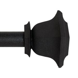 May include: A black, decorative curtain rod with a textured finish. The rod features a geometric finial with a pointed, angular design. The rod is designed to be mounted on a wall and is suitable for various window treatments.
