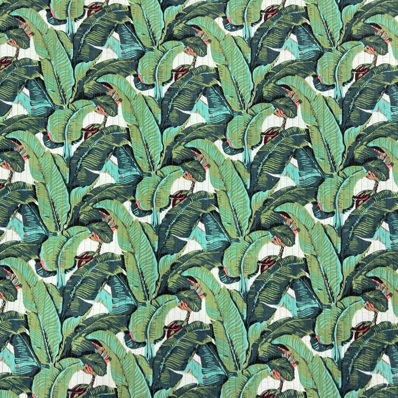May include: A repeating pattern of large, overlapping banana leaves in shades of dark forest green, vibrant lime green, and teal. The leaves are set against a thin, vertical white pinstripe background, creating a dense, botanical textile design.