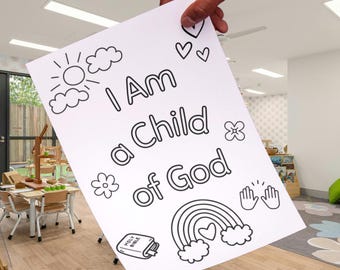 May include: A white coloring sheet featuring the words "I Am a Child of God" alongside line drawings of a sun, clouds, hearts, flowers, a rainbow, a Bible, and clapping hands. The sheet is held up by a hand.