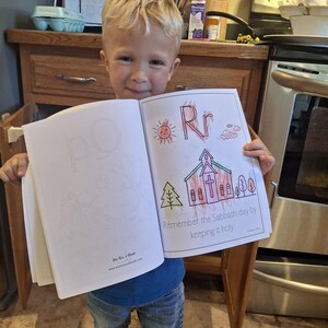 A preschooler coloring, christian bible, verse alphabet pages