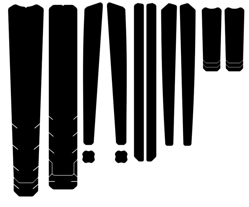 May include: A set of black vinyl stickers for a skateboard deck. The stickers are shaped like various geometric shapes, including rectangles, triangles, and squares.