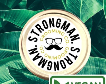 Cera para bigote vegana Strongman de fijación media-fuerte, lata de 1 oz