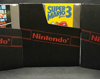 Super Mario Bros NES Cartridges & Dust Sleeves: Super Mario/Duck Hunt, Mario 2, Mario 3 NES Set