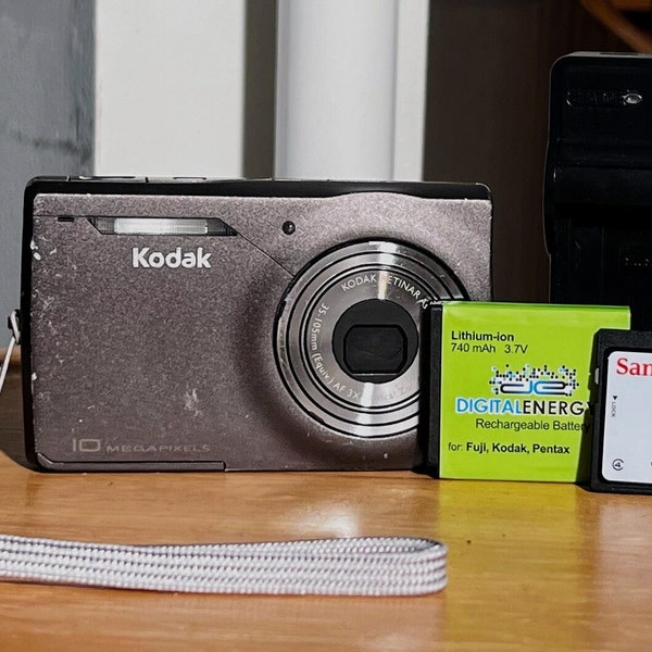 Kodak EasyShare M1033 10 Megapixel Digital Camera Bundle w/ Original Strap, New Battery & Charger and 4MP Memory Card Ready-to-Shoot Digicam