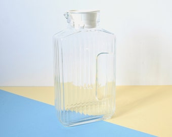 Glass pitcher, rectangular, with stopper, from the 90s