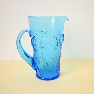 Large vintage blue pitcher, in glass, tulip pattern
