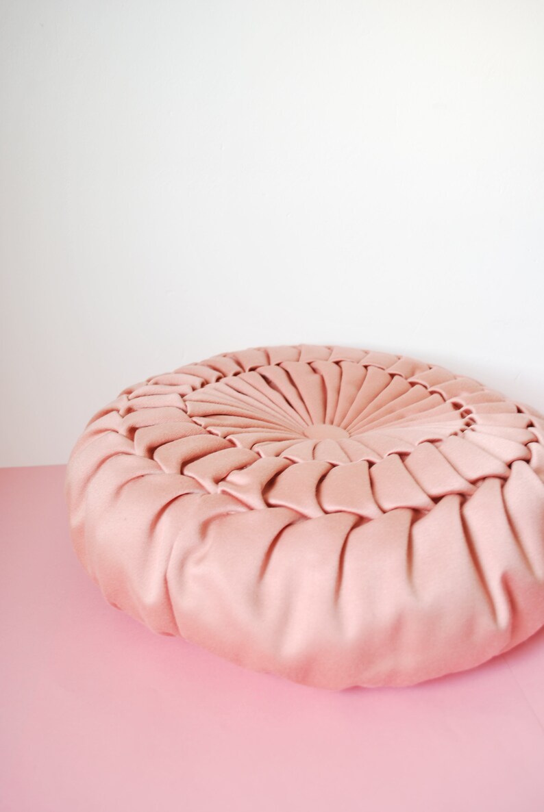 Beautiful pink round decorative cushion draped with two sides vintage