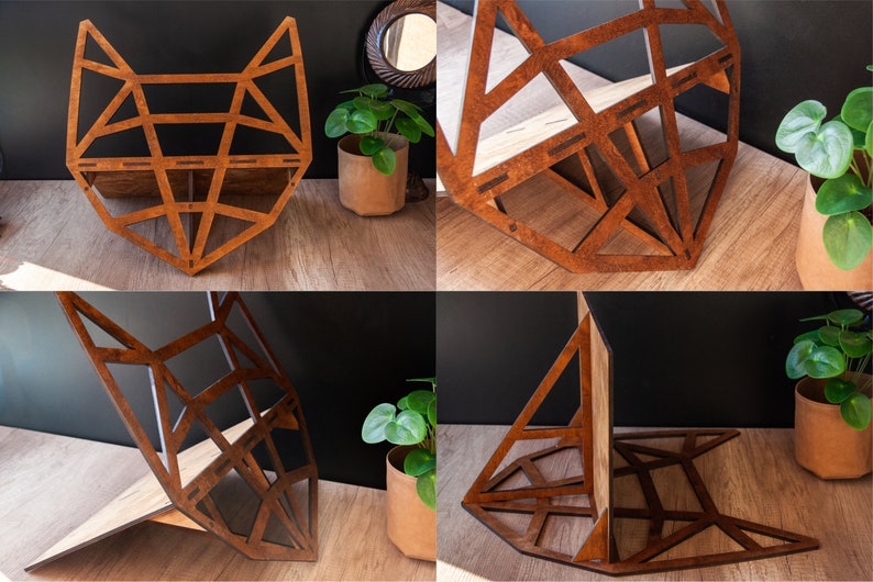 May include: A wooden geometric fox head shelf unit with three shelves. The shelf is made of brown wood and has a geometric design. The shelf is shown in different positions, including standing upright and leaning against a wall.